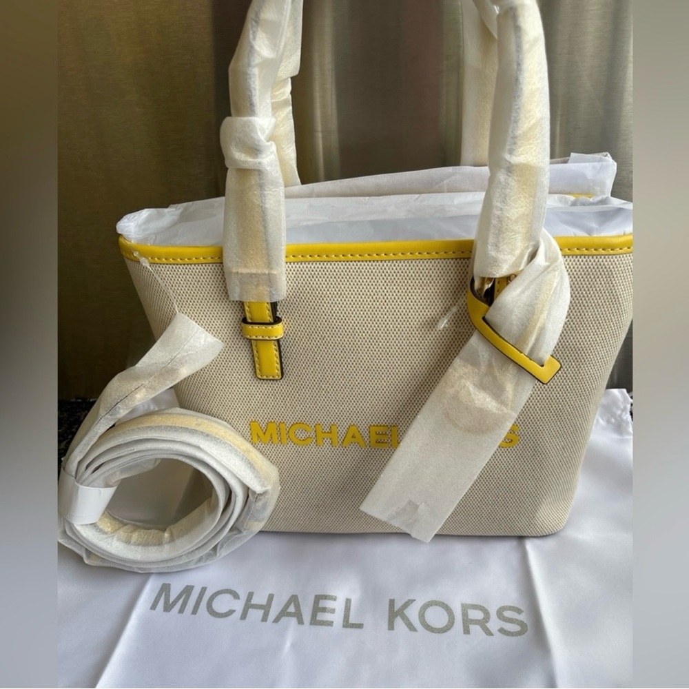 NWT Michael Kors Cream and yellow jet travel crossbody